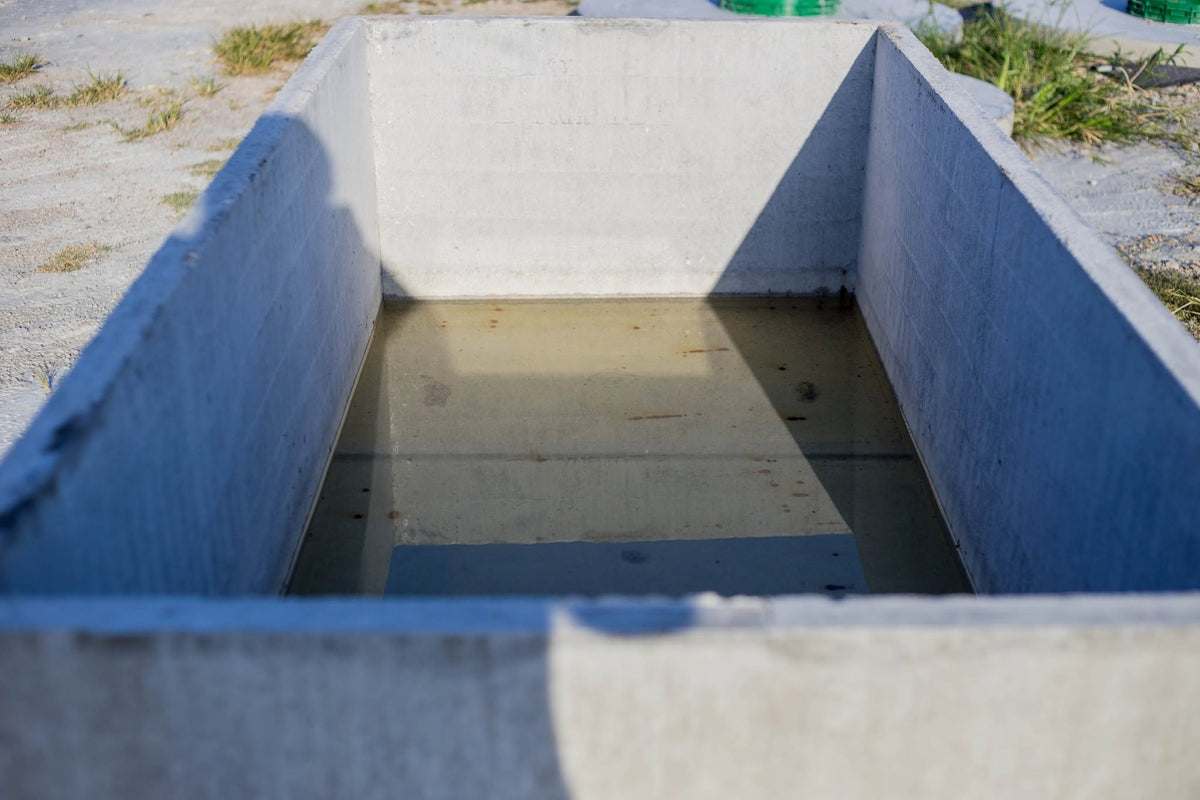 Texas Precast C Box precast concrete open box without lid sitting in the yard