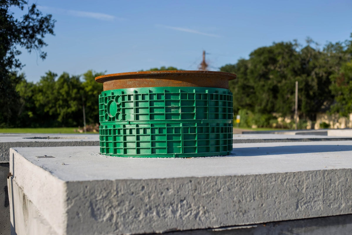 Texas Precast 20 inch concrete septic tank riser with cast iron lid