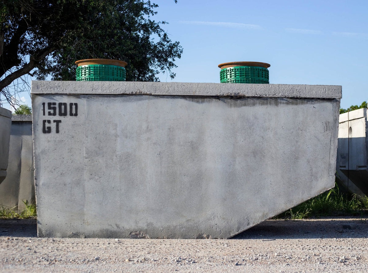 Texas Precast 1500 gallon concrete grease interceptor with two 20 inch risers and lids installed