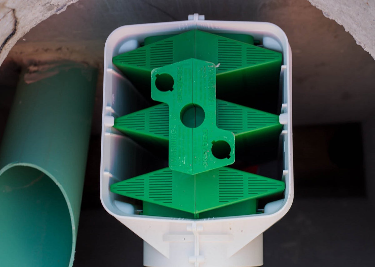 Polylok PL-625 effluent filter cartridge installed in its housing