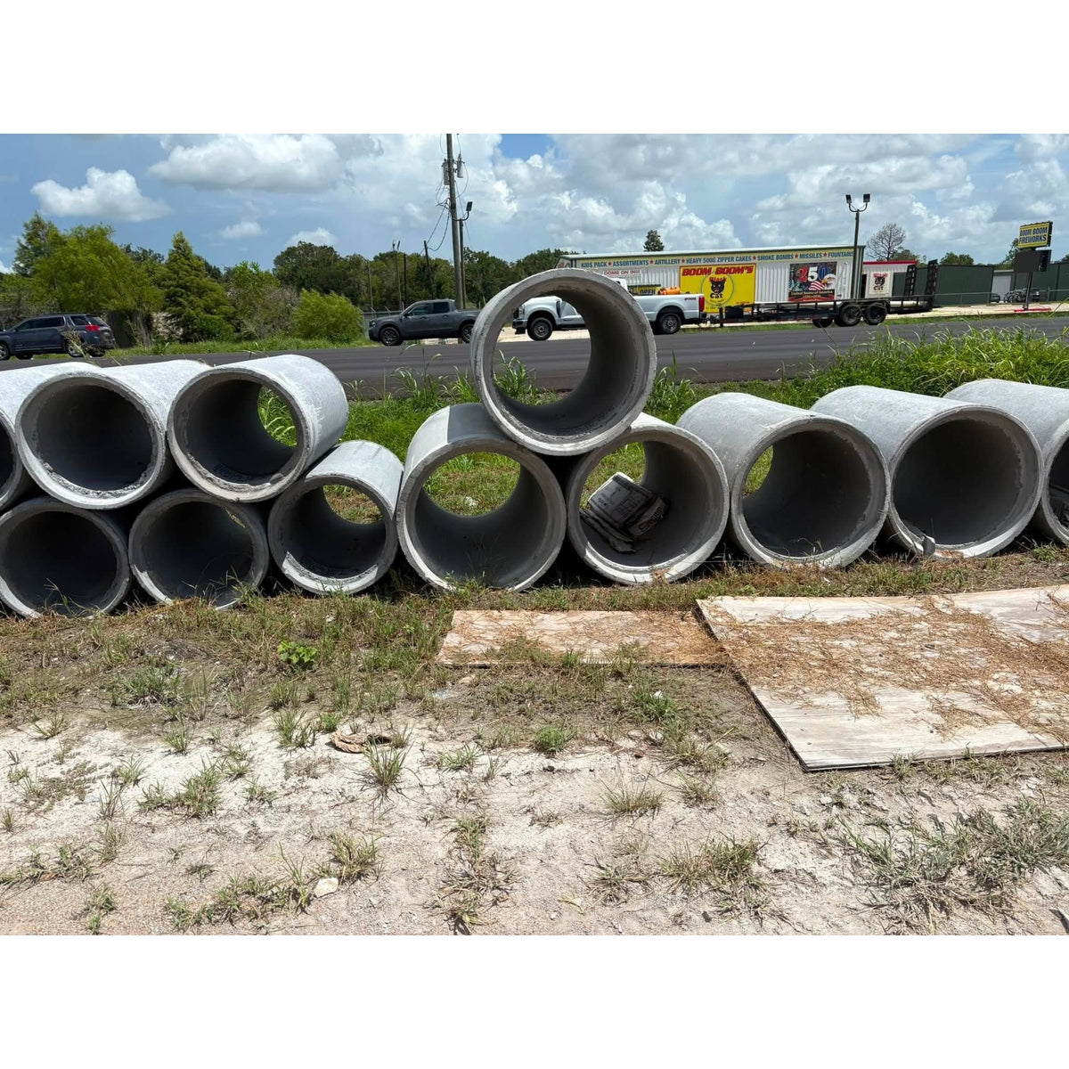 Texas Precast reinforced concrete pipe stacked in the manufacturing yard