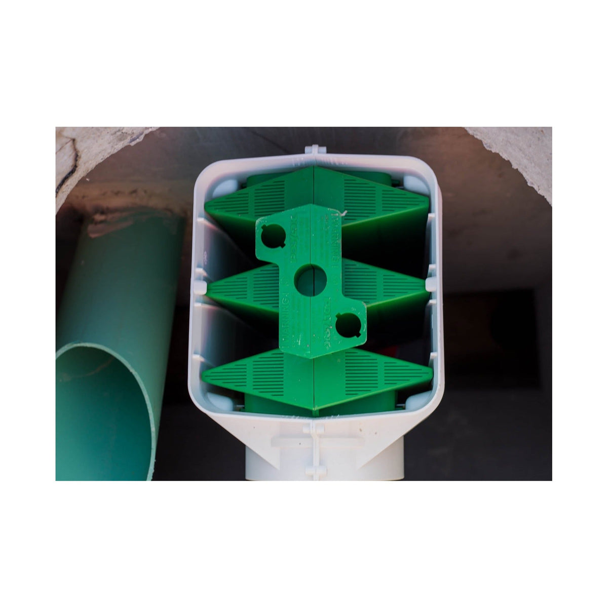Polylok PL-625 effluent filter cartridge inside its housing