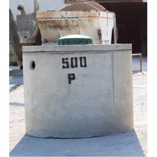 Texas Precast 500 gallon round concrete pump tank stencilled 500 P in the manufacturing yard
