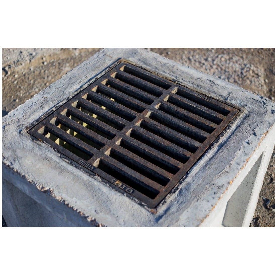 Cast iron frame and grate on a Texas Precast concrete catch basin