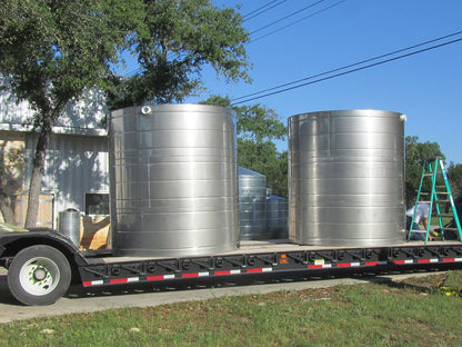 Texas Metal Tanks 2500 gallon stainless steel rainwater tank on a flatbed trailer